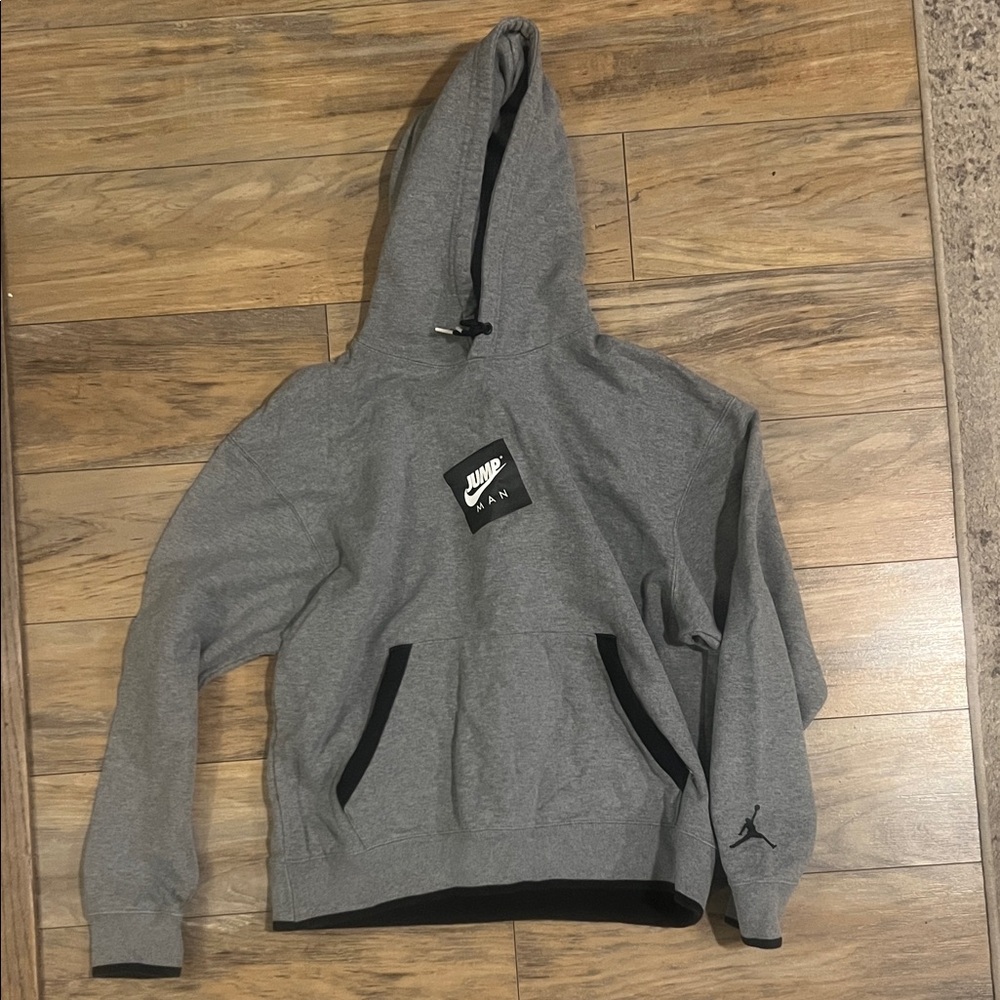 Jordan Heather Gray Hoodie with Black Emblem